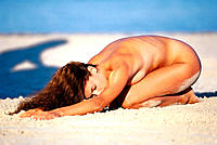 Nude woman on the beach