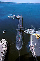 USS Nevada submarine (SSBN 733) moves into explosive handling wharf. Bangor Submarine Base. Washington. USA