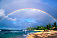 Double rainbow and evening light on Tunnels Beach, North Shore, Island of Kauai, Hawaii