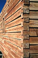 Detail of wall joint of log home under construction. Colorado. USA
