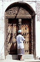 Traditional carved wooden door in Stone Town. Zanzibar. Tanzania