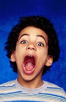 Young boy screaming portrait