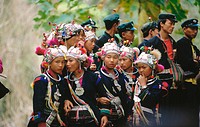 Akha girls and boys with traditional costumes near Muang Sing. North Laos