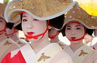 Women in traditional costume at Hanagasa Junko (procession of floral bonnets) during Gion Matsuri traditional Japanese festival. Kyoto. Japan