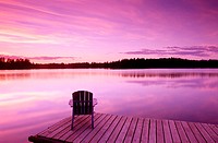 Lifestyles. Early dusk. Adirondack chair at lake. Near Anchorage. Southcentral Alaska. USA.