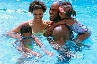 African Amer family in a pool