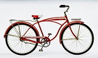 Vintage red and white 1950´s-era bicycle; white background