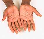 Black man´s hands with palms up.