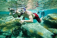 Couple snorkeling on Colombier Beach, St. Barts