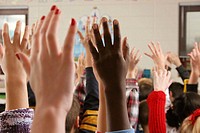 hands in air shot at public school in suburb of Chicago, Illinois. USA