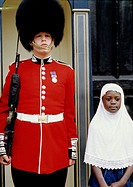Guard and African girl, London. England, UK