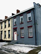 A historical street in the Northeastern United States is captured in Winter.