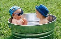 babies in a outdoor tub