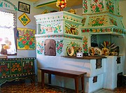 Painted clay oven in painted house in Zalipie, Poland