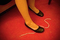 Necklace on carpet