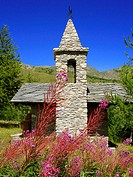 A little mountain chapel made of stones in a natural park near Aosta, in the Italian Alps