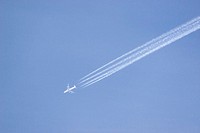 Airplane with white smoke