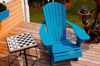Blue chair and checker board
