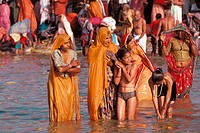 India, Veranasi , family bathing in the Gange River