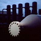 Industrial plant at dusk; detail of piping