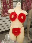 Fuzzy red bikini lingerie on mannequin, in store window
