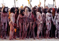 Procession of naked pilgrims going for a holy bath in Ganges River during Khumb Mela Festival (2001), Allahabad. Uttar Pradesh, India