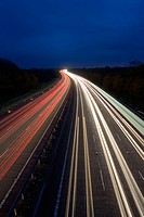 Traffic trails on the M40 motorway in Warwickshire, England, UK
