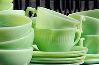 1950´s Vintage Green Glass Dishes displayed at an outdoor flea market