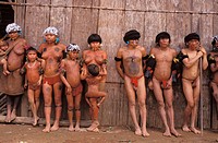 Yanomamo tribeman and tribewoman participating in a ceremony