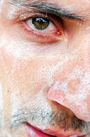 Man with soap lather on face