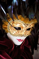 Venetian carnival mask display in a specialist shop near Rialto, San Polo, Venice, Veneto, Italy