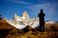 Tourist taking a picture at the Fitz Roy. Argentina.