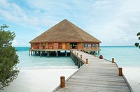 Boardwalk guiding to resort in Maldives Island, Indian Ocean.