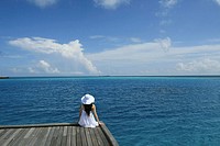 Woman on swimmingpool, Maldives, Indian Ocean