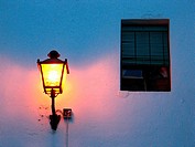 Street lamp in a street at night. Conil de la Frontera. Cádiz province. Andalucía. Spain.