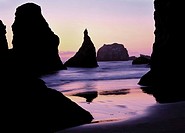 Rock monoliths in sunset at Bandon Beach. Oregon Coast