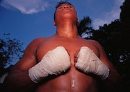 Man´s wrapped hands in Muay Thai training camp, Bangkok. Thailand
