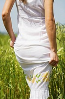 Woman in white dress in the countryside