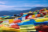 Prayer flags on top of jizu shan mountain, yunnan, China