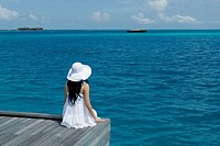 Womon Sitting on Ocean, Maldives