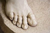 Detail of foot from sculpture, Vatican museum, Rome, Italy