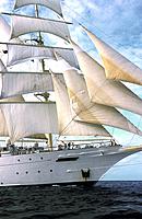 The starborad bow of a clipper ship sailing on the Caribbean Sea off the Central American country of Honduras