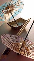 Chopsticks and oriental umbrellas
