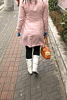 Young woman in trendy white boots. Shanghai. China