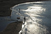 Fishermen on a beach near l´Escala. Girona province. Catalonia. Spain