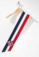 Ceremonial sash on a coat hanger