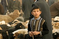 Young Uygur boy at the Livestock Market in Kashgar, Xinjiang Provence, China