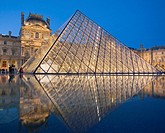 The new entrance to the Musee du Louvre, a pyramidal, glass structure designed by renowned American architect I M Pei  Paris, France