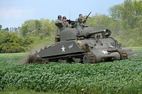 American tank crew in  in a WWII reenactment at the Willow Run Airport in Bellville, Michigana
