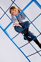 Child in the playground on the grid